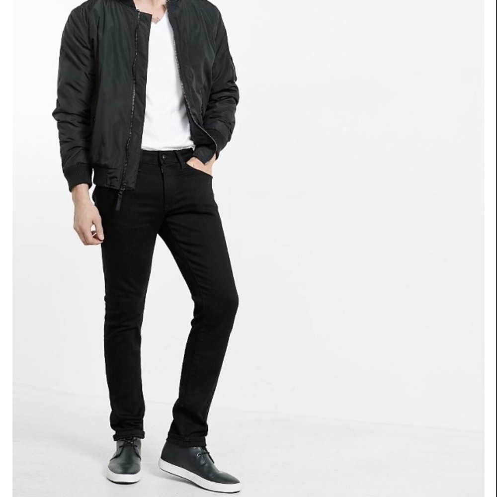 Men’s Express black skinny 4 way stretch jeans.